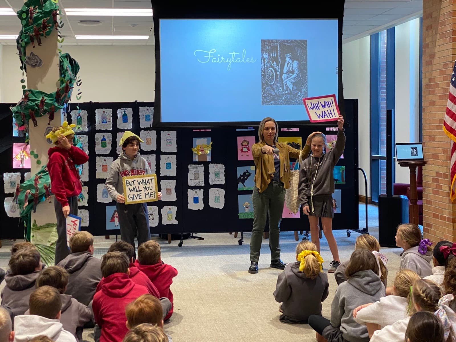 Liesl leading a reader’s theatre of Rumpelstiltskin with students at a school visit